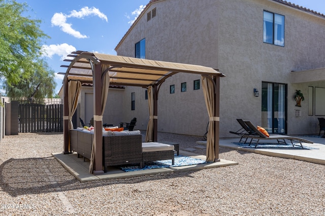 view of patio with a pergola and an outdoor living space