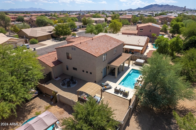 bird's eye view with a mountain view