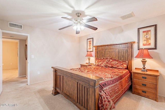 bedroom with light colored carpet and ceiling fan