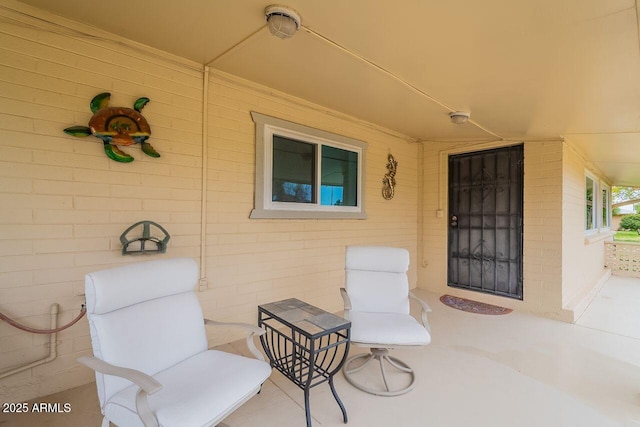 property entrance with a patio