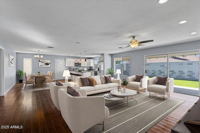 spare room featuring carpet floors, ceiling fan, and baseboards