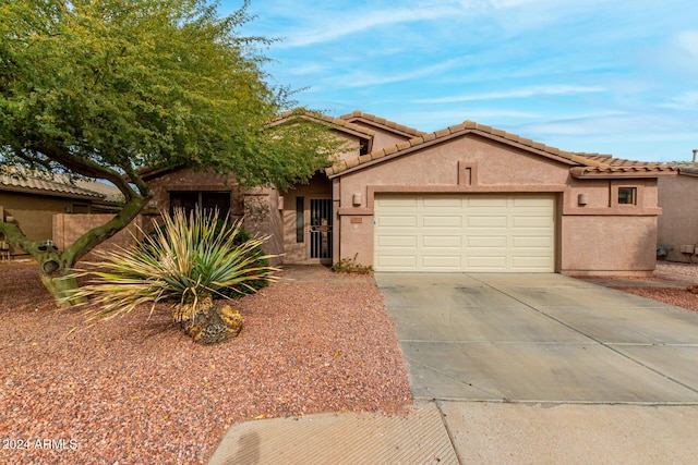 view of front of home with a garage