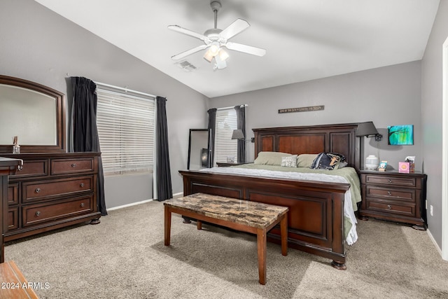 carpeted bedroom featuring ceiling fan and lofted ceiling