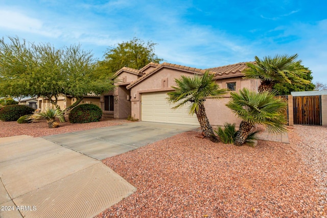 view of front of property featuring a garage