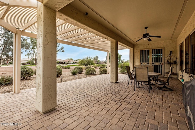 view of patio featuring ceiling fan and a pergola