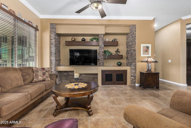 living room with ceiling fan and ornamental molding