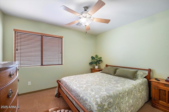 bedroom with baseboards, visible vents, ceiling fan, and carpet