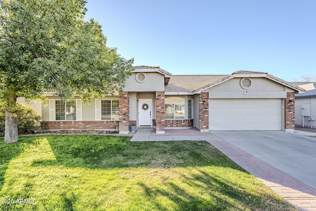 view of front of home with a front yard and a garage