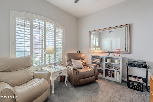 8180 E Shea Blvd Unit 1043, Scottsdale, AZ 85260 - living area with healthy amount of natural light, carpet floors, and a ceiling fan