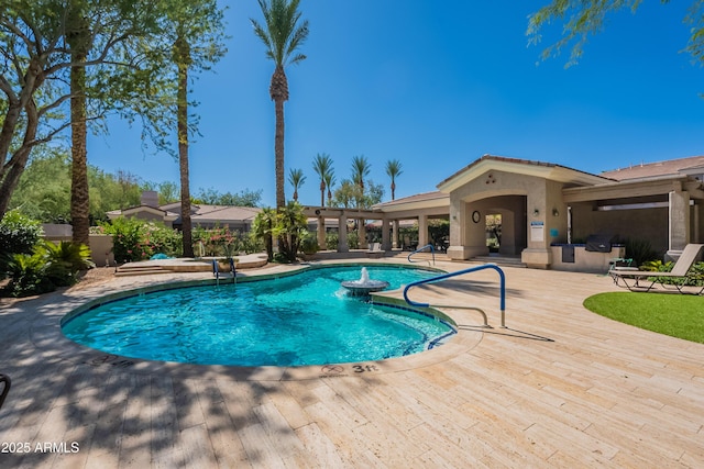 8180 E Shea Blvd Unit 1043, Scottsdale, AZ 85260 - outdoor pool featuring a patio area