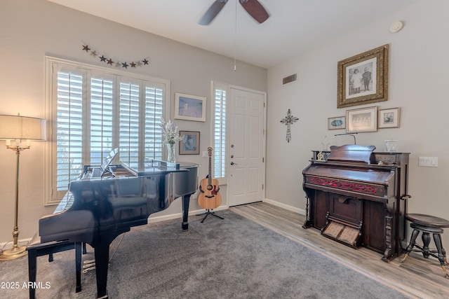 8180 E Shea Blvd Unit 1043, Scottsdale, AZ 85260 - foyer featuring wood finished floors, healthy amount of natural light, and a ceiling fan