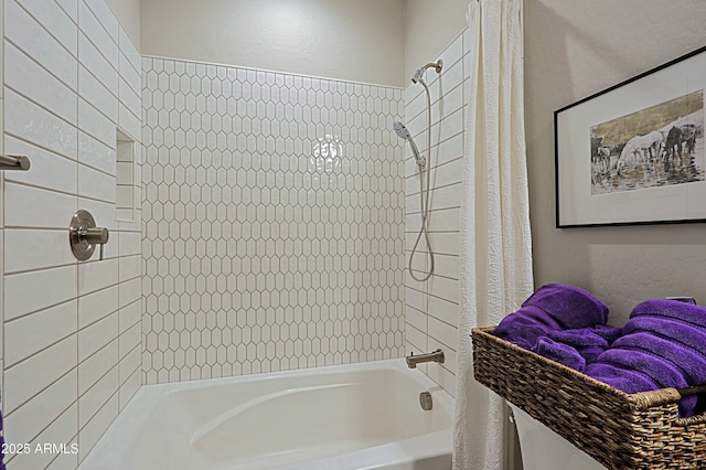 bathroom with shower / bath combo