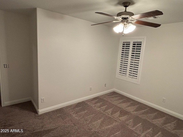 carpeted empty room with ceiling fan