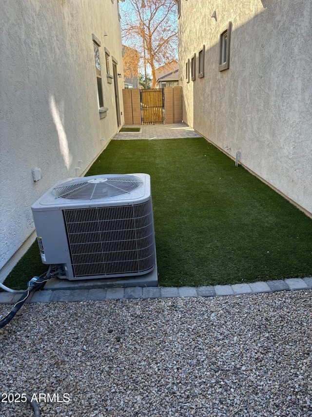 view of yard featuring central AC