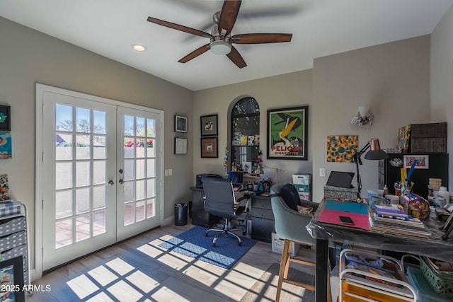 office featuring recessed lighting, ceiling fan, wood finished floors, and french doors