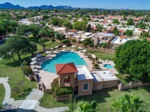 birds eye view of property featuring a mountain view