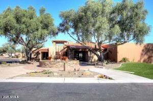 view of adobe home