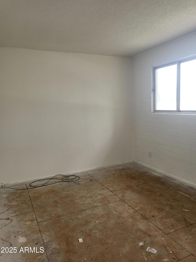 920 N 82nd St Unit H208, Scottsdale, AZ 85257 - spare room with a textured ceiling