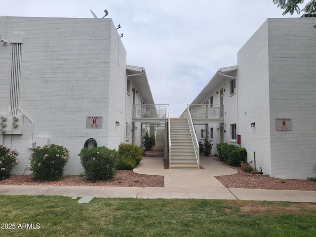 920 N 82nd St Unit H208, Scottsdale, AZ 85257 - view of building exterior with stairway