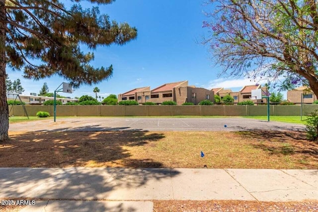 920 N 82nd St Unit H208, Scottsdale, AZ 85257 - view of yard with a residential view and community basketball court