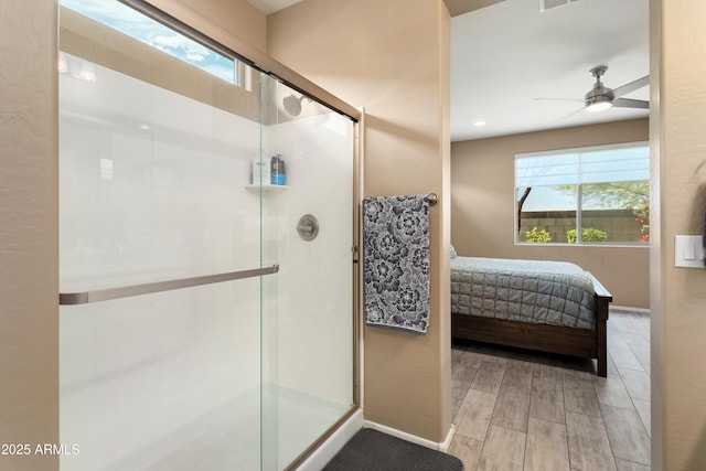 26242 N 122nd Ln, Peoria, AZ 85383 - bathroom with connected bathroom, a ceiling fan, visible vents, wood finished floors, and a stall shower