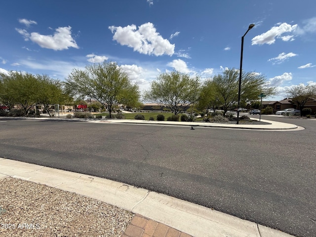 26242 N 122nd Ln, Peoria, AZ 85383 - view of road featuring sidewalks, street lights, and curbs