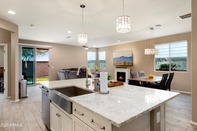 26242 N 122nd Ln, Peoria, AZ 85383 - kitchen with open floor plan, a sink, and visible vents
