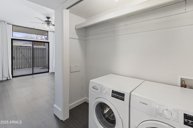 laundry area featuring ceiling fan, dark wood-type flooring, and washer and clothes dryer