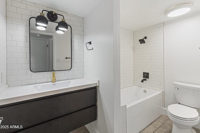 full bathroom featuring tiled shower / bath, decorative backsplash, tile patterned flooring, vanity, and toilet