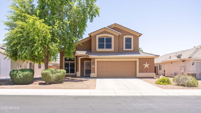 12933 W Monterey Way, Avondale, AZ 85392 - mediterranean / spanish house with stucco siding, a tiled roof, concrete driveway, and an attached garage