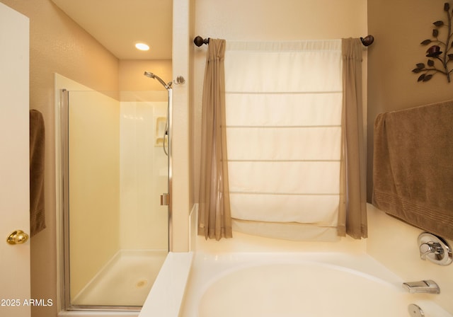 12933 W Monterey Way, Avondale, AZ 85392 - bathroom featuring a shower stall and a garden tub