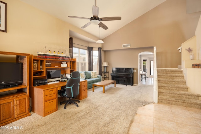 12933 W Monterey Way, Avondale, AZ 85392 - office area featuring light carpet, arched walkways, a ceiling fan, and high vaulted ceiling