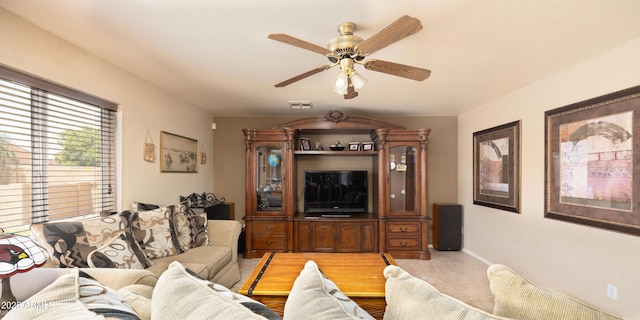 12933 W Monterey Way, Avondale, AZ 85392 - living room with light tile patterned flooring and a ceiling fan