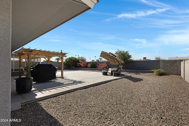 view of yard featuring a patio area and a pergola