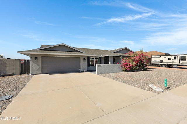 ranch-style home with a garage