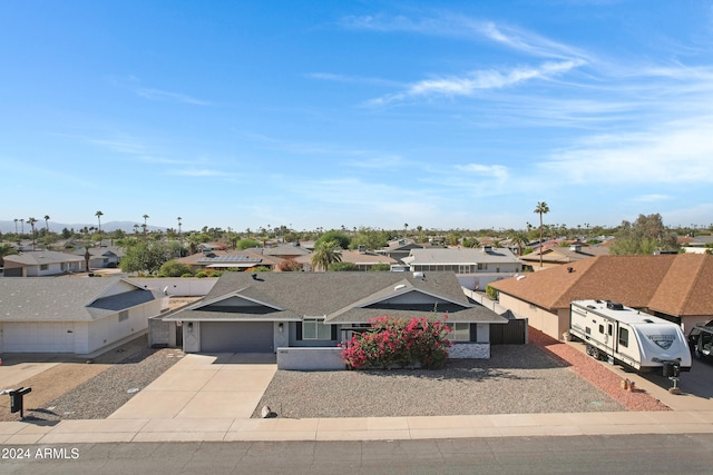 ranch-style home with a garage