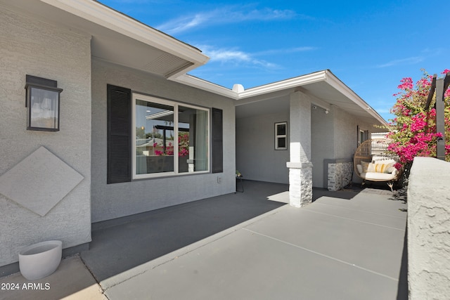 view of home's exterior with a patio