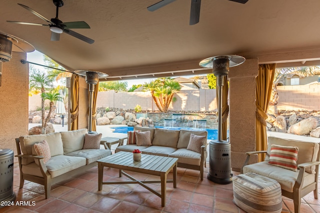 view of patio featuring outdoor lounge area and a fenced in pool