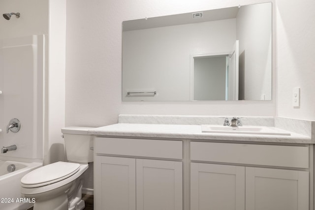 full bath featuring visible vents, toilet, vanity, and  shower combination