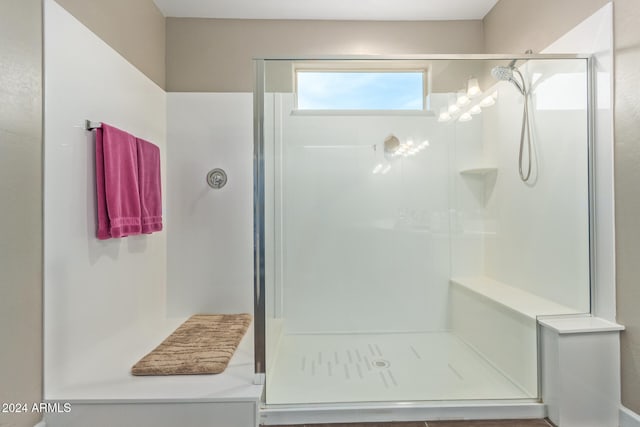 bathroom featuring walk in shower