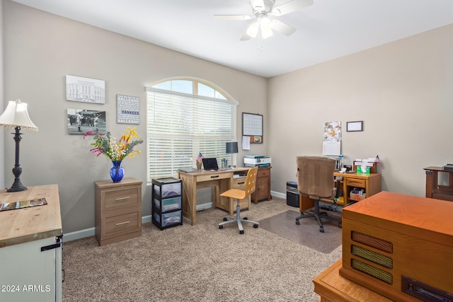 home office with ceiling fan and light colored carpet