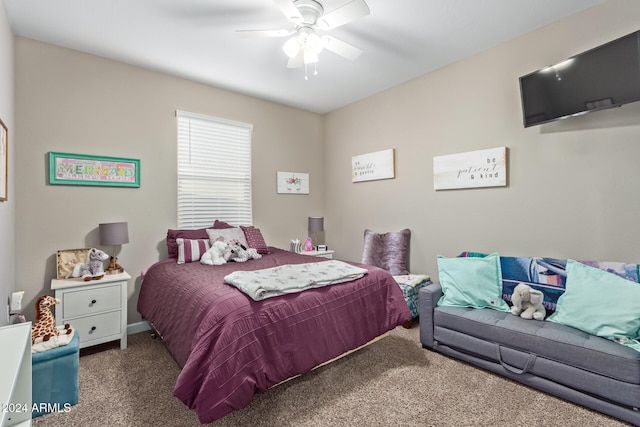 bedroom with ceiling fan and dark carpet