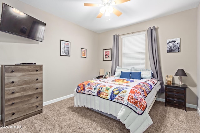 bedroom with ceiling fan and carpet floors