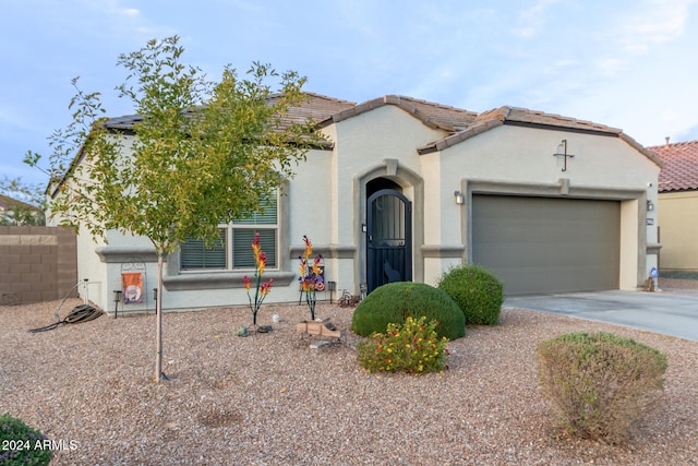 view of front of property featuring a garage