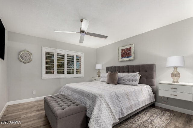 bedroom with hardwood / wood-style flooring and ceiling fan