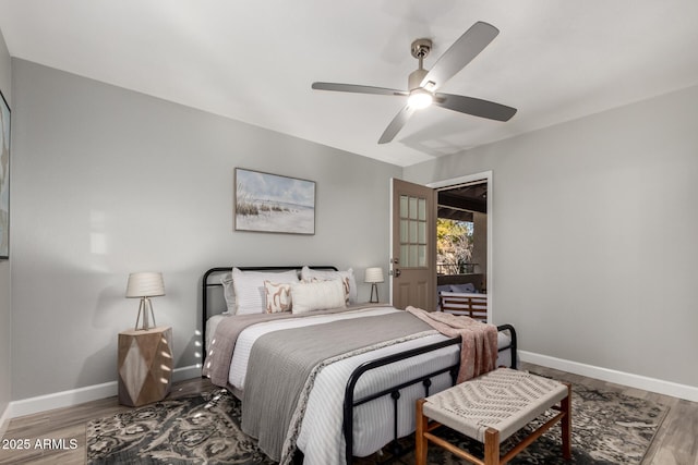 bedroom featuring hardwood / wood-style flooring and ceiling fan