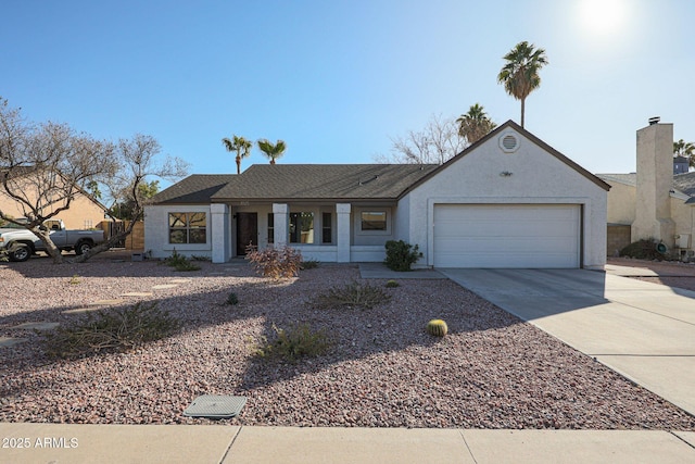 single story home featuring a garage