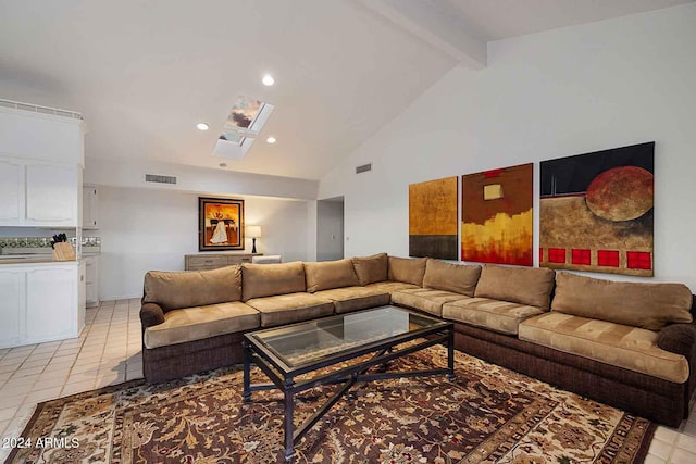 living room featuring high vaulted ceiling, beam ceiling, a skylight, and light tile patterned floors