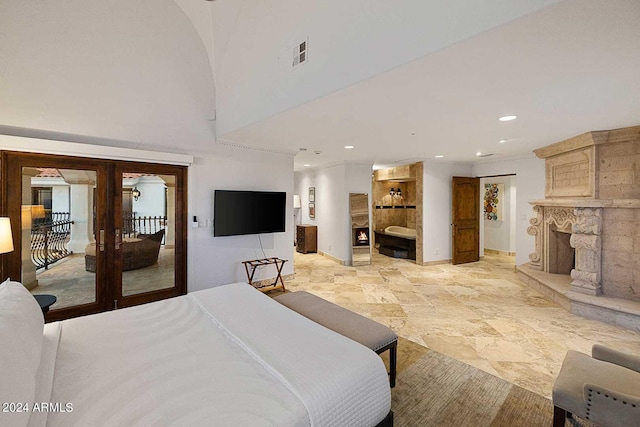 bedroom featuring a fireplace and ornamental molding