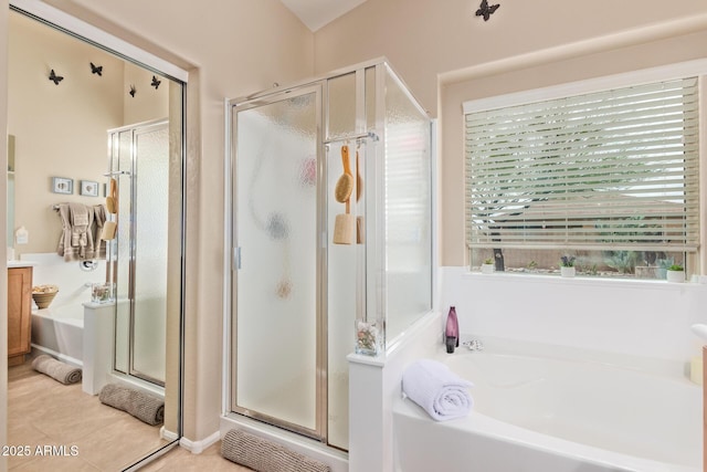 bathroom with tile patterned flooring and plus walk in shower